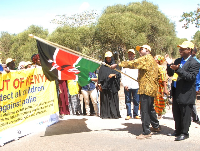 Isiolo County Govenor, Godana  Doyo, flags off a march at the launch of the Polio campaign in Kenya  for Jan 18-22