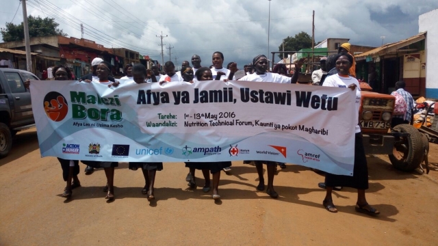 Health workers and members of the community commemorate AVW & Malezi Bora celebrations in West Pokot County, Kenya, recently