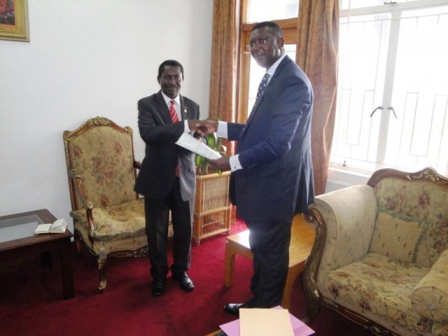 Honorable Minister of Foreign Affairs and International Cooperation, Mr Ephraim Chiume (left) receiving Dr. Eugene Nyarko’s credential at the Minister’s Office, Capital Hill