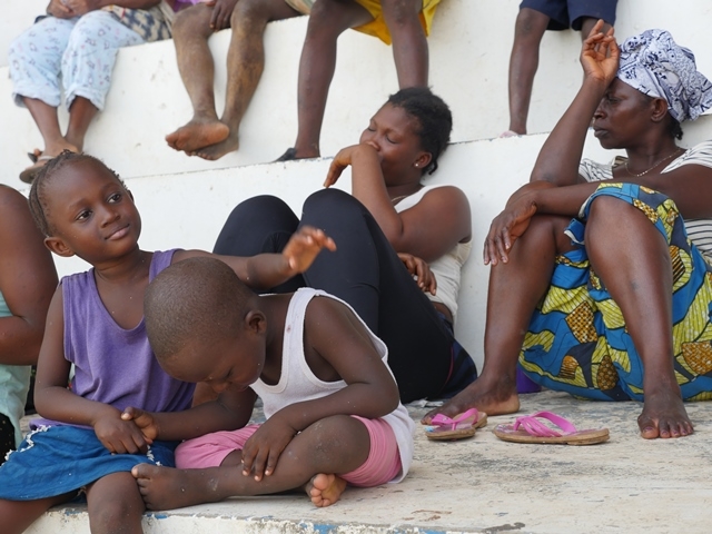 A cross section of families affected by the 2015 flooding in Freetown