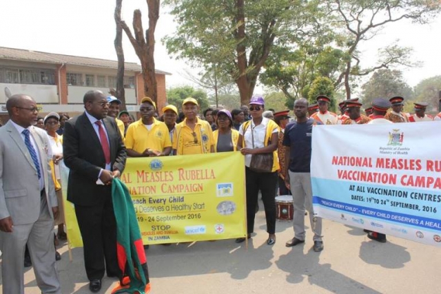 Minister of Health, Hon. Chitalu Chilufya flagging off the march at the launch of the national MR vaccination campaign in Lusaka.