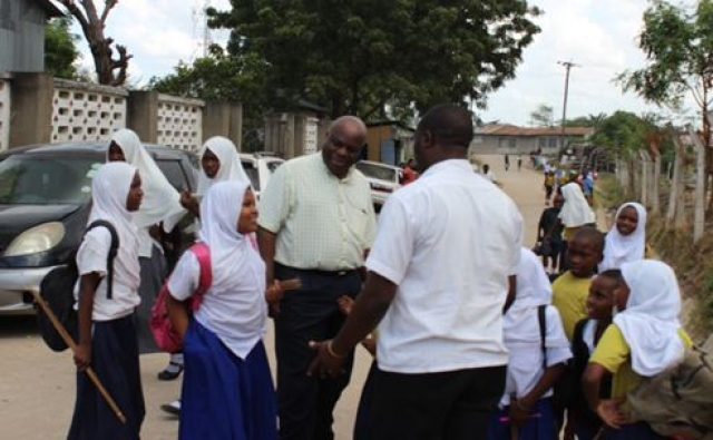 WHO Representative, Dr. Rufaro Chatora, interacting with the school children from affected communities to gauge awareness on cholera prevention measures.