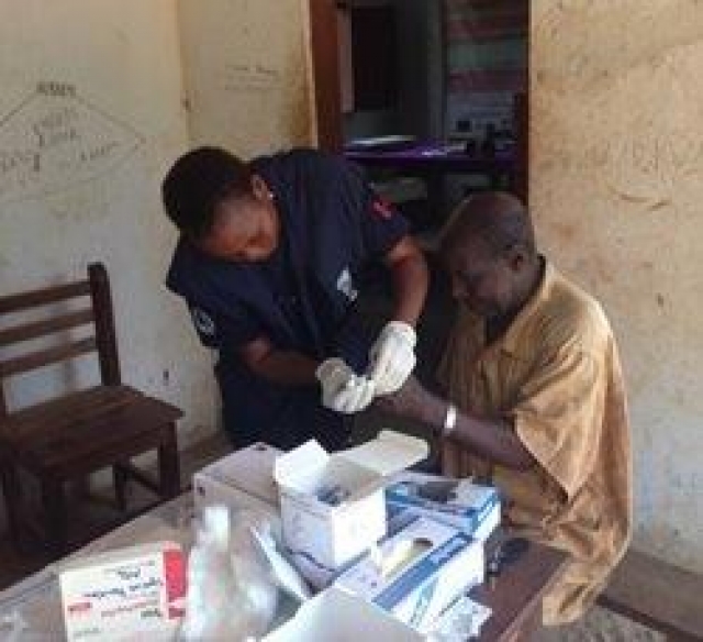 A laboratory technician at WHO collecting blood specimens for testing Lymphatic Filariasis