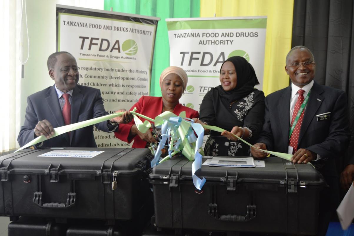 Official launch of the minilab kits. From Left to right: Dr. Matthieu Kamwa, WHO Representative a.i,; Honourable Ummy Ally Mwalimu, Minister of Health, Community Development, Gender, Elderly and Children;  Mrs Zaina Thabit, Representative of the Ministerial Advisory Board; Mr Hiiti Sillo, Director General, Tanzania, Food and Drug Authority (TFDA) and Mr Yohana Hebroni, Acting Director, laboratory services, TFDA