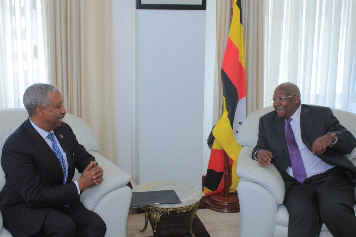 Dr Tegegn (left) and Hon Sam Kutesa discuss during the ceremony 