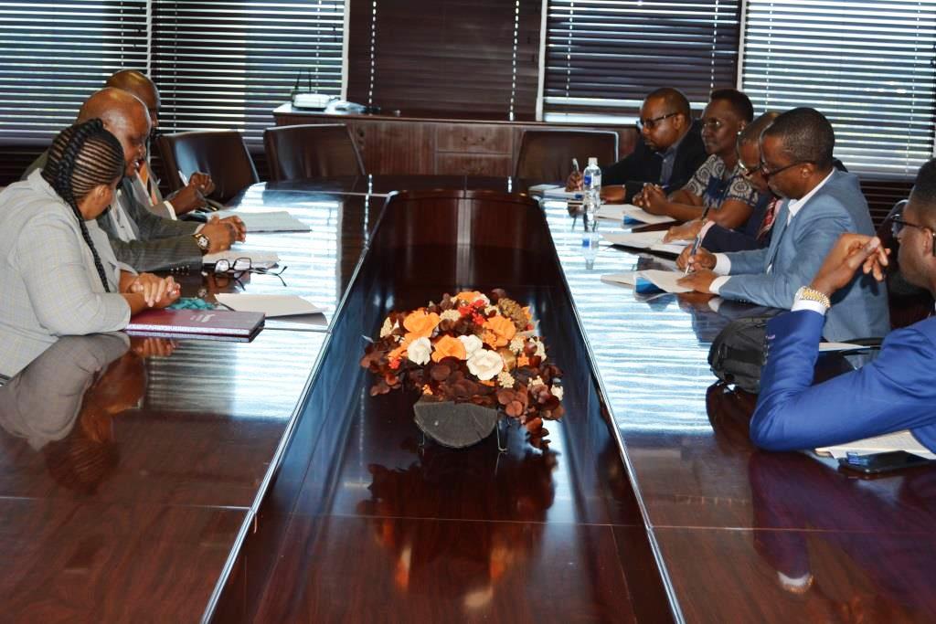 Acting Minister of Health Hon. Phillip Makgalemele (left, centre) discussing with the WHO team