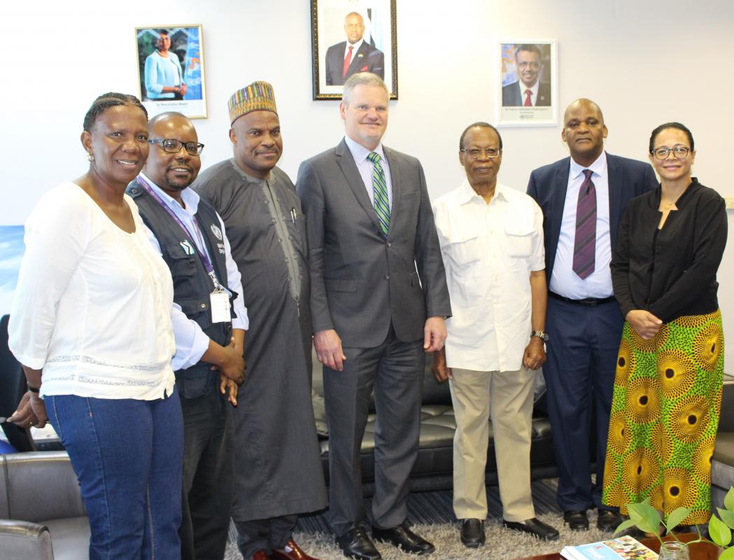 Ambassador of the United States to Botswana, His Excellency Craig Cloud (centre)  and to his is Dr Martins Ovberedjo, the WR