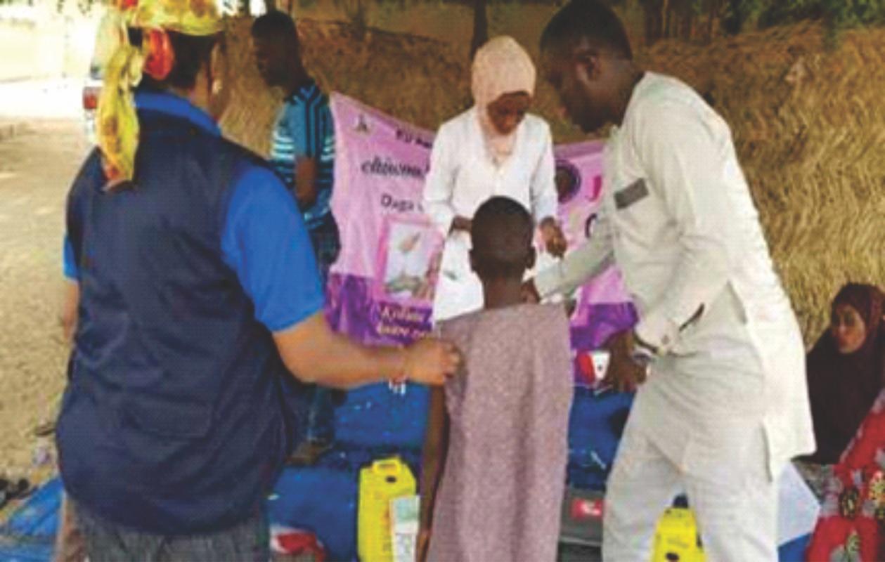 Field teams administrating measles vaccine during the 1st phase of the vaccination campaign in Borno state