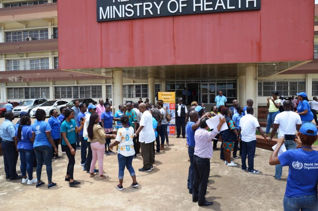 Health partners in Liberia formed a solidarity as a symbol of their commitment to working collaboratively towards UHC during the 2019 WHD commemoration in Liberia 