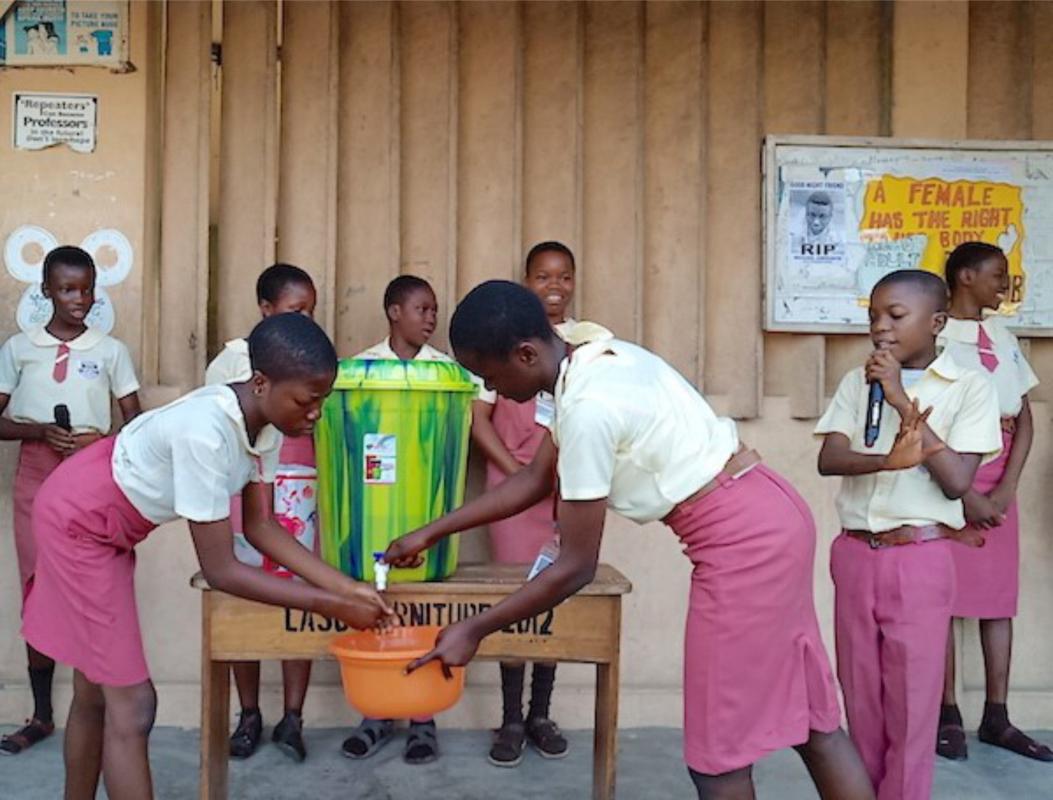 Ambassadors demonstrating Handwashing