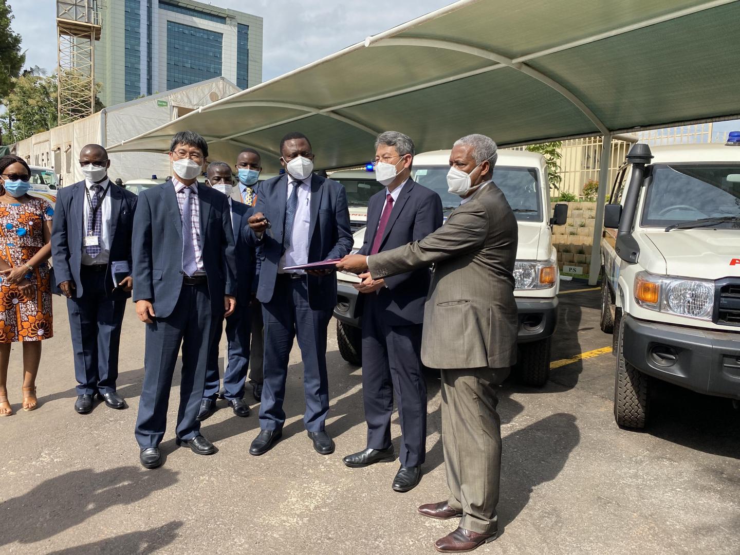 Ministry of Health Director of Clinical Services, Dr. Charles Olaro officially receives the ambulances from the Ambassador of Korea to Uganda H.E Ha Byung-Kyoo and WHO Representative in Uganda Dr Yonas Tegegn Woldemariam