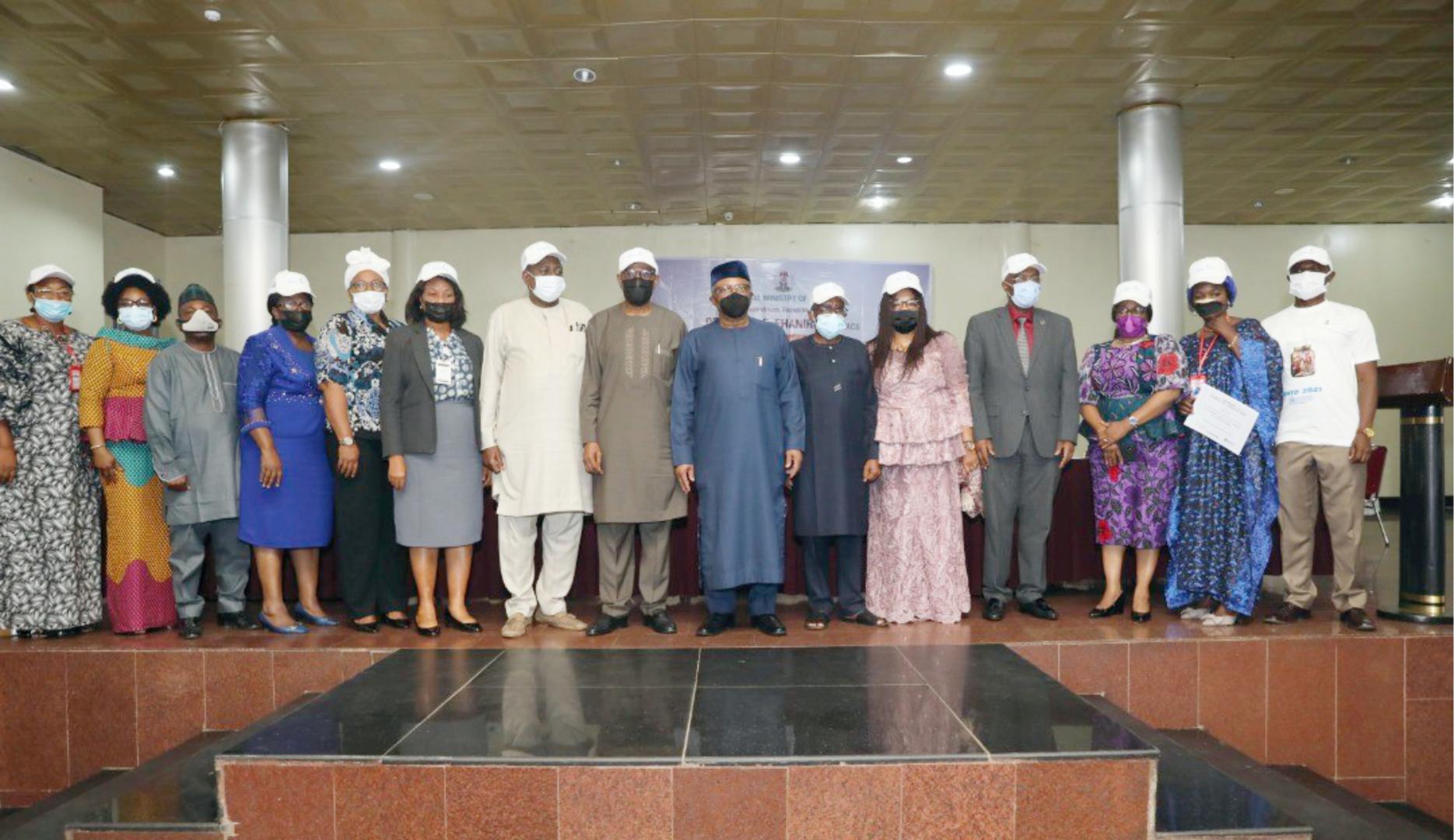 The Minister of Health (7th right), the WR (4th right) and other dignitaries at the Press Conference to mark 2021 WNTD in Abuja. Photo credit_WHO_Ochemba.jpg