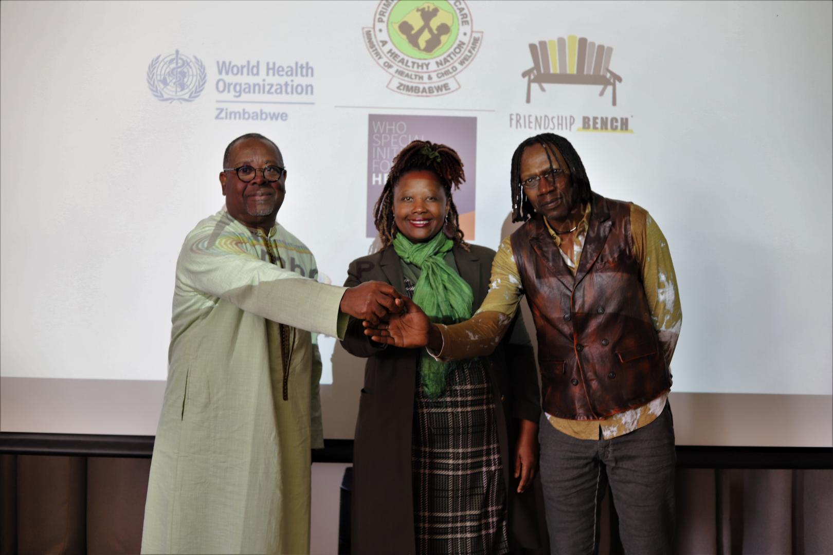 WHO Zimbabwe Country Representative a.i Professor Jean-Marie Dangou(Left),Dr. Patience Maunganidze, MoHCC Deputy Director of the Mental Health Department (middle) and Friendship Bench Director Professor, Dixon Chibanda 