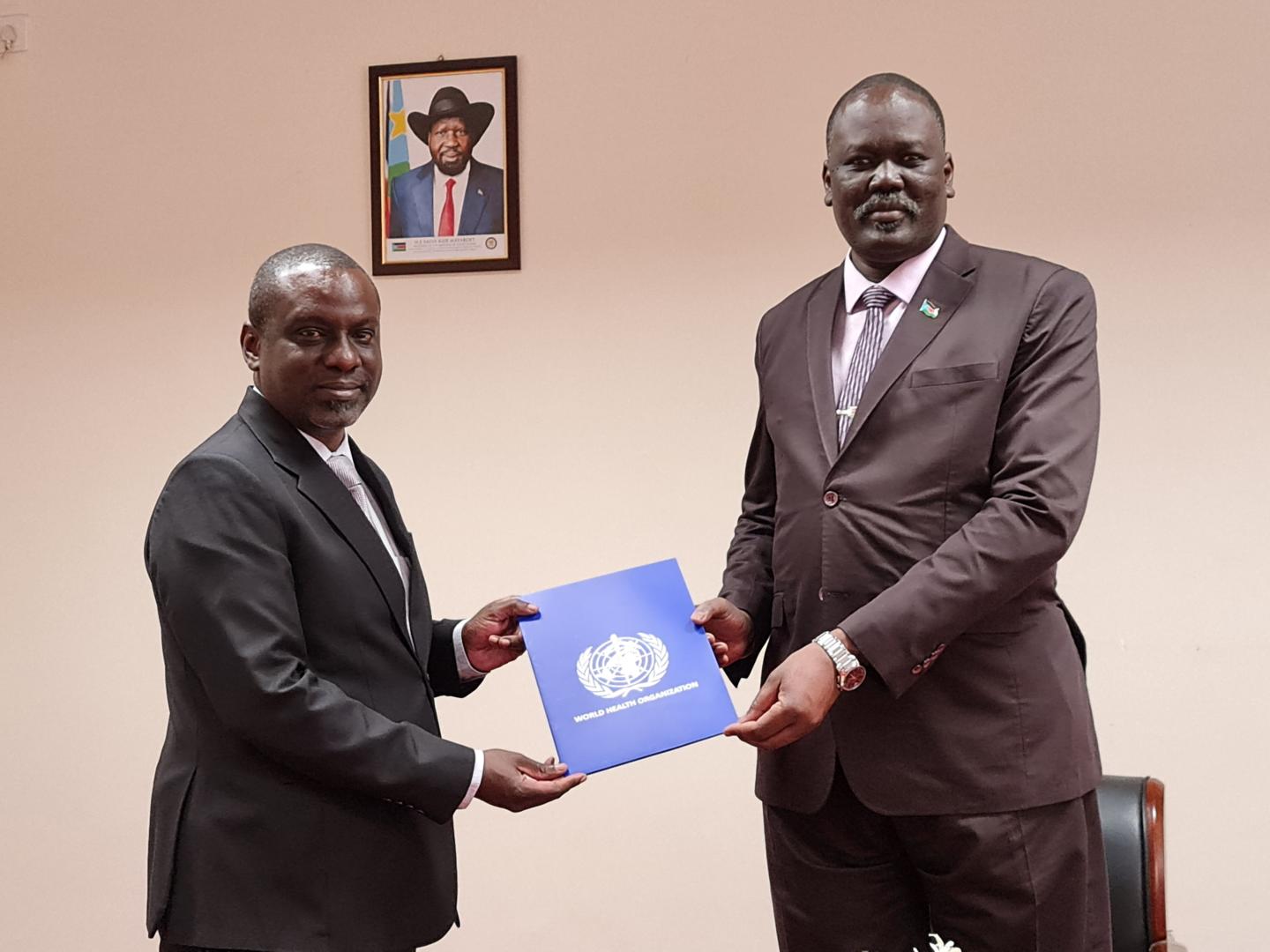 Dr Humphrey Karamagi, presents his letter of credentials to Honorable Ramadan Mohamed Abdallah Goc, Minister of Foreign Affairs and International Corporation, South Sudan