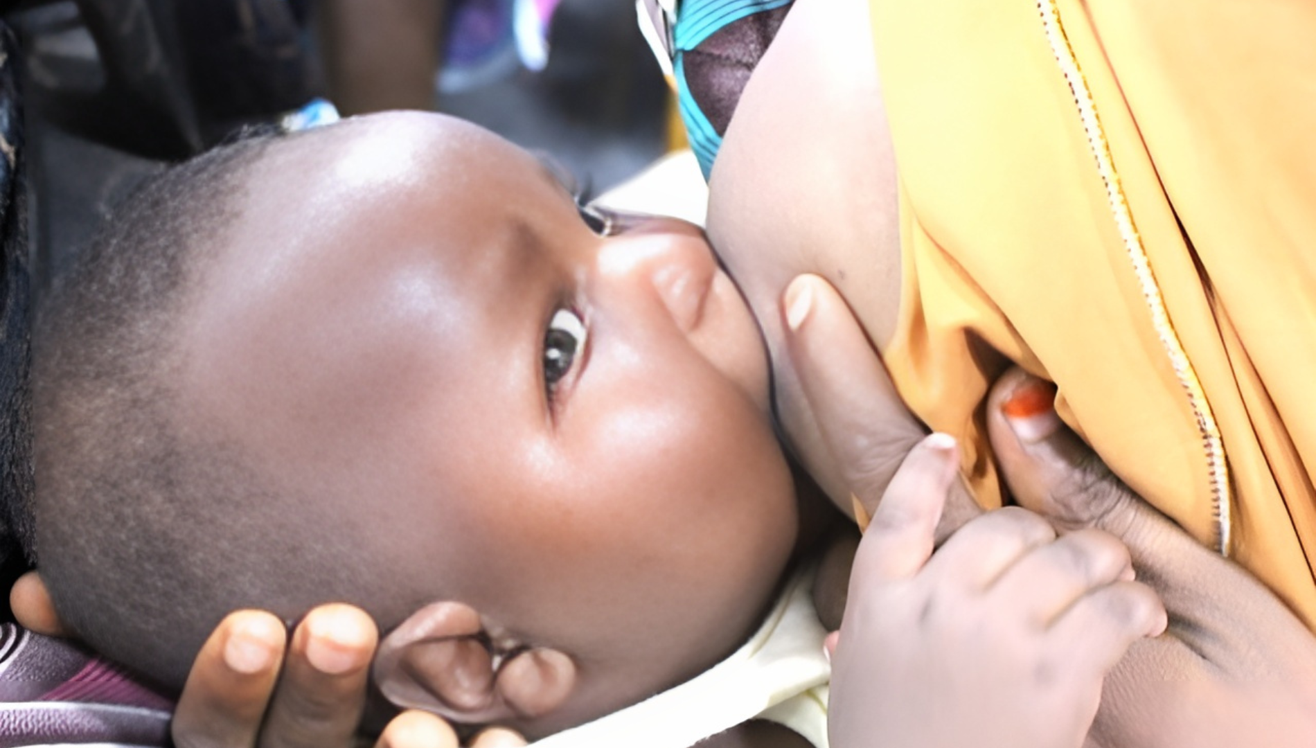 A mother breastfeeding her baby  