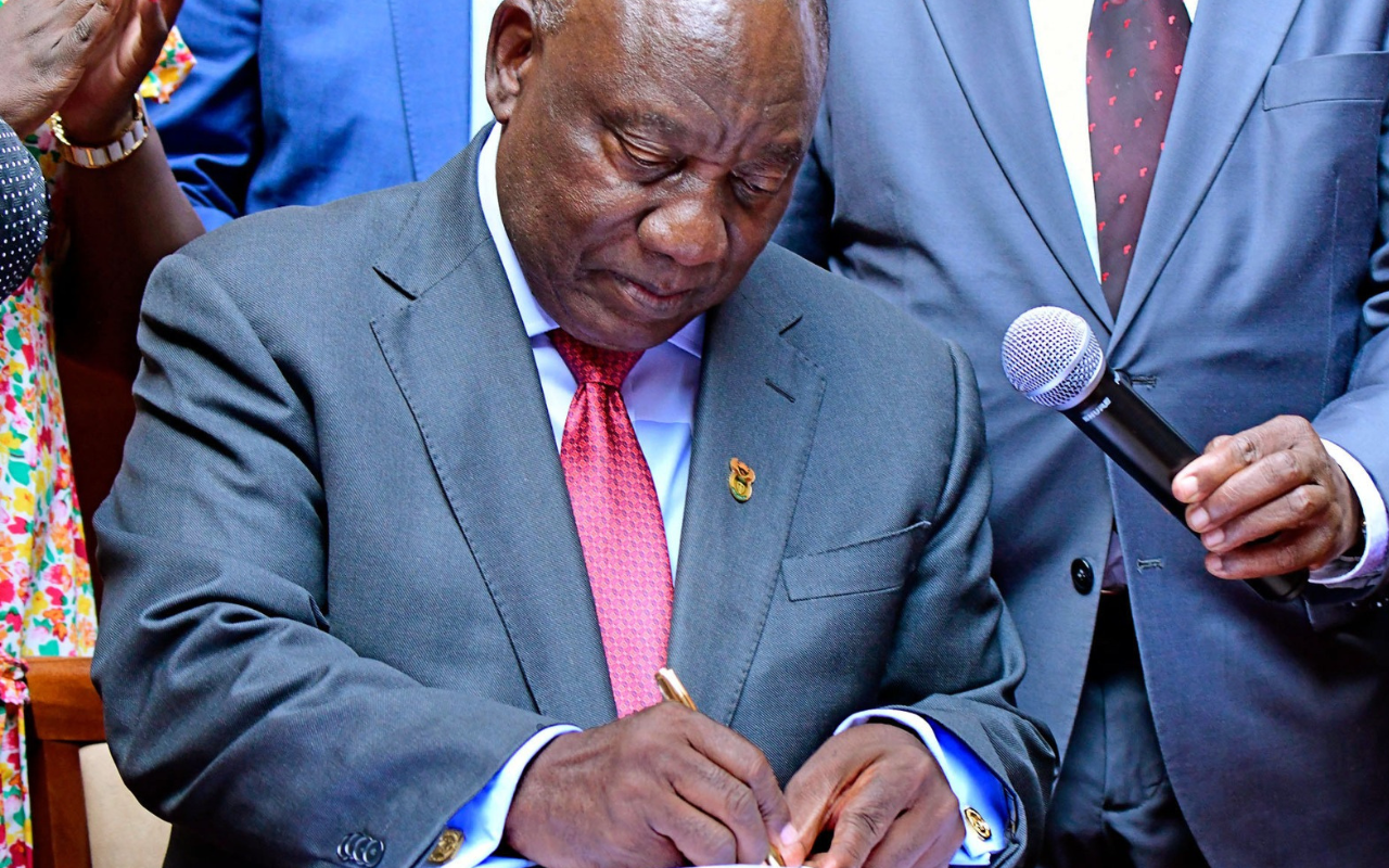 His Excellency President of the Republic of South Africa signing the NHI Bill into law