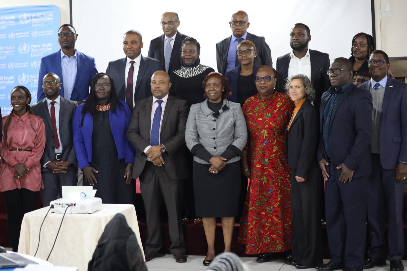 Minister of Health Honorable Mduduzi Matsebula and the WHO Representative Dr Susan Tembo posing with the team of external experts during the official opening of the JEE   