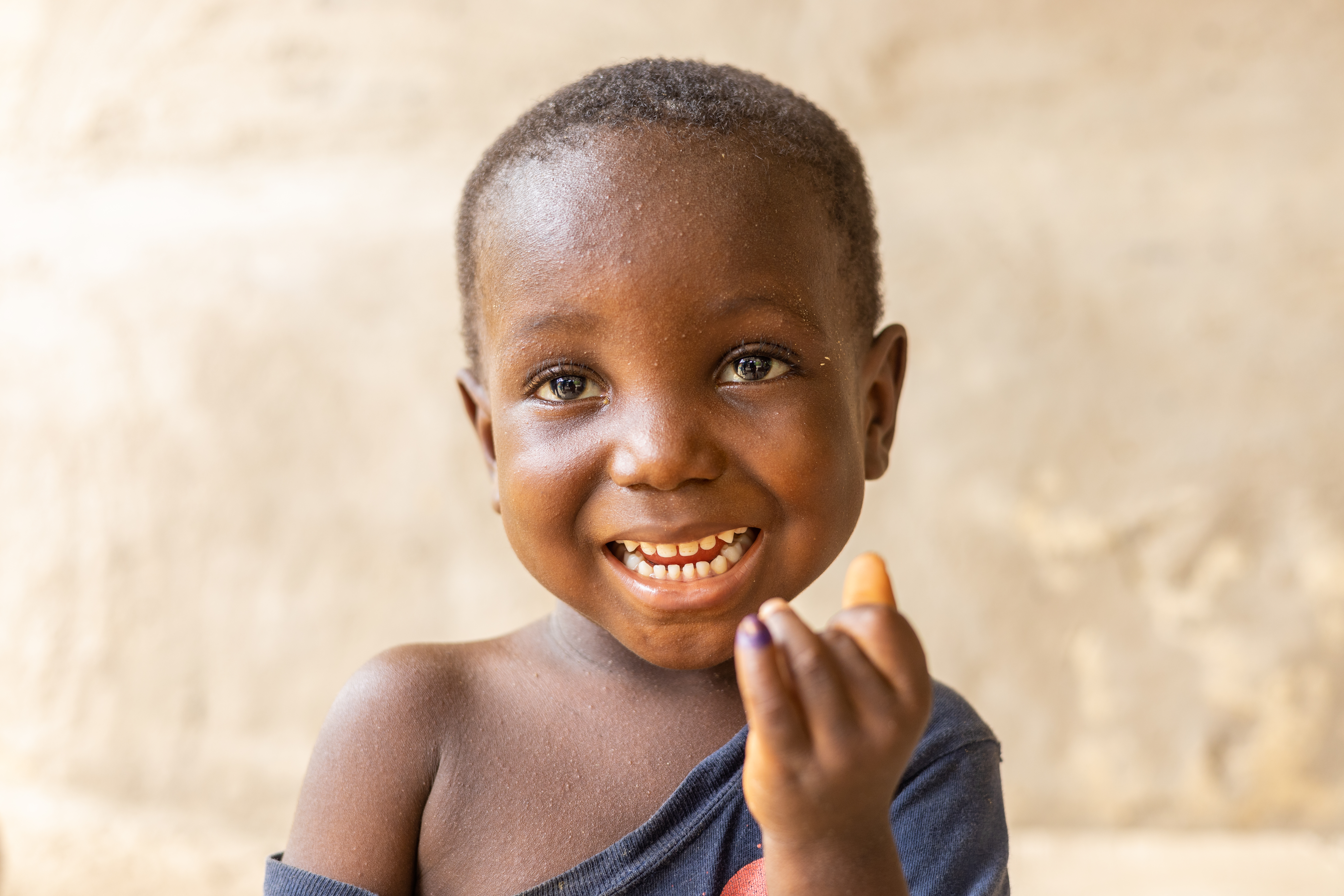 A happy child after receiving polio vaccination