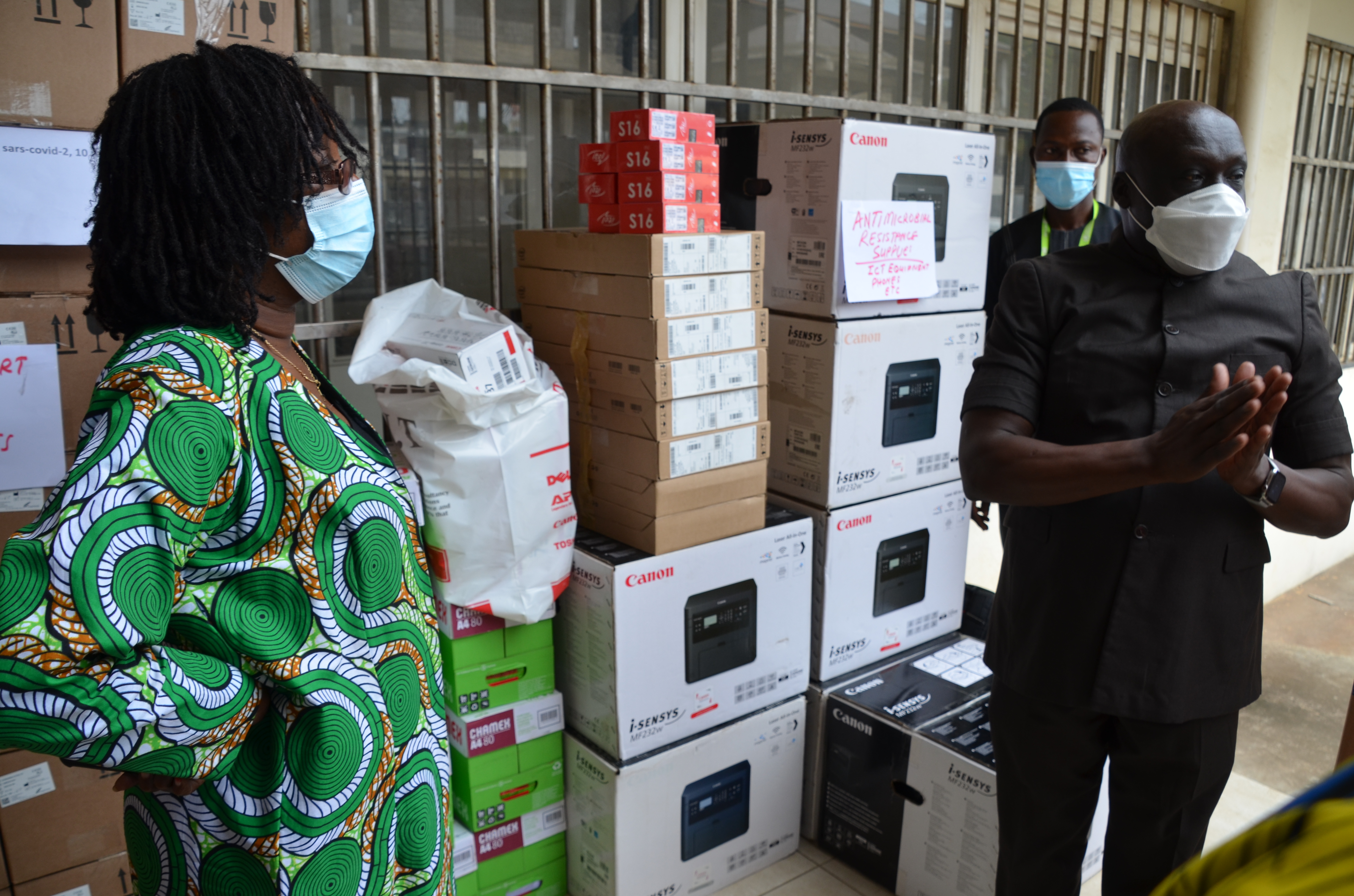 Dr. Peter Clement, WR Lib handingover ICT equipment to Health Minister Dr.Jallah in Monrovia