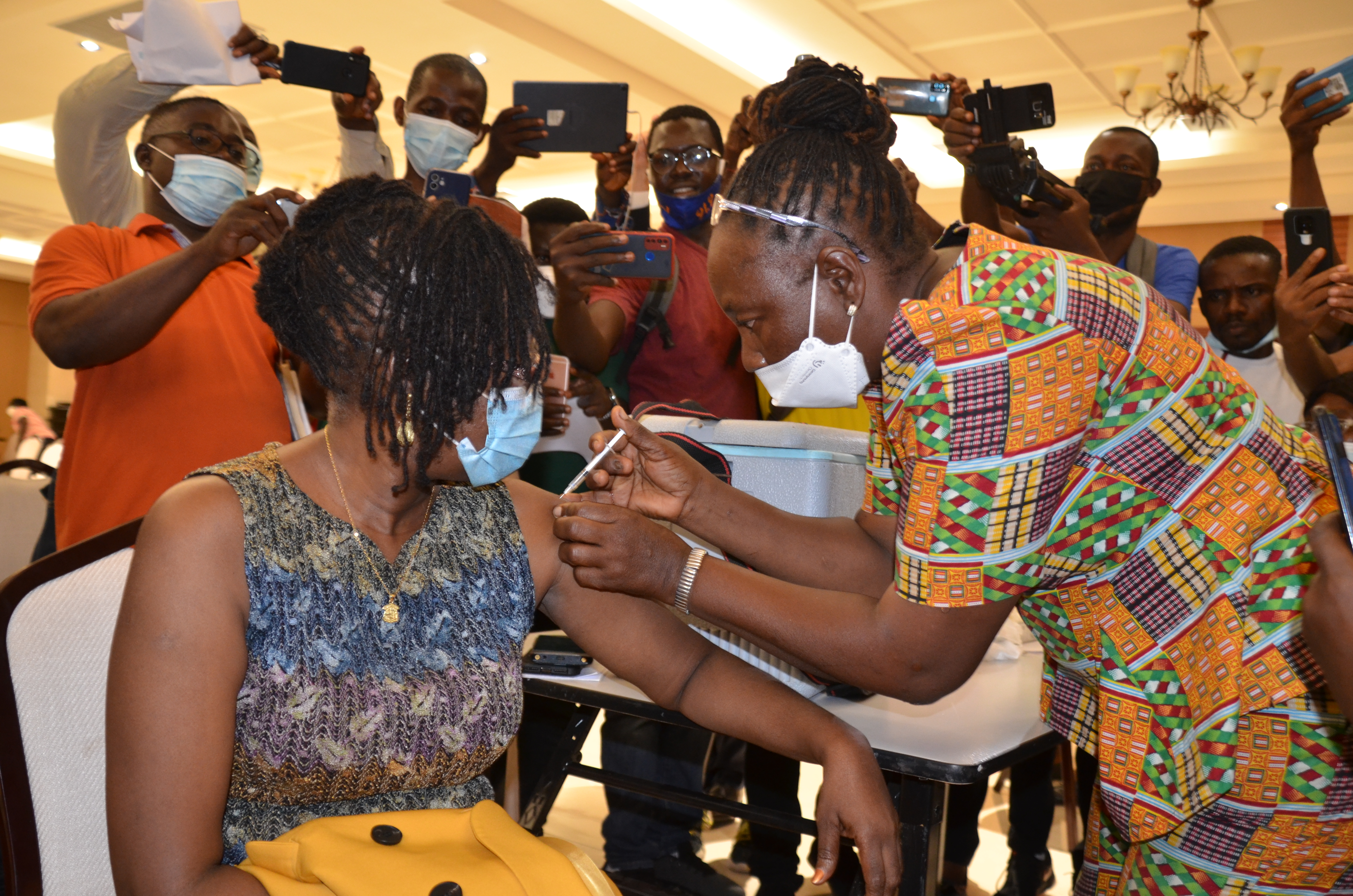 Dr. Jallah, Minister of Health receiving first shot of COVID-19 vaccine during the launch in Monrovia, April 1, 2021