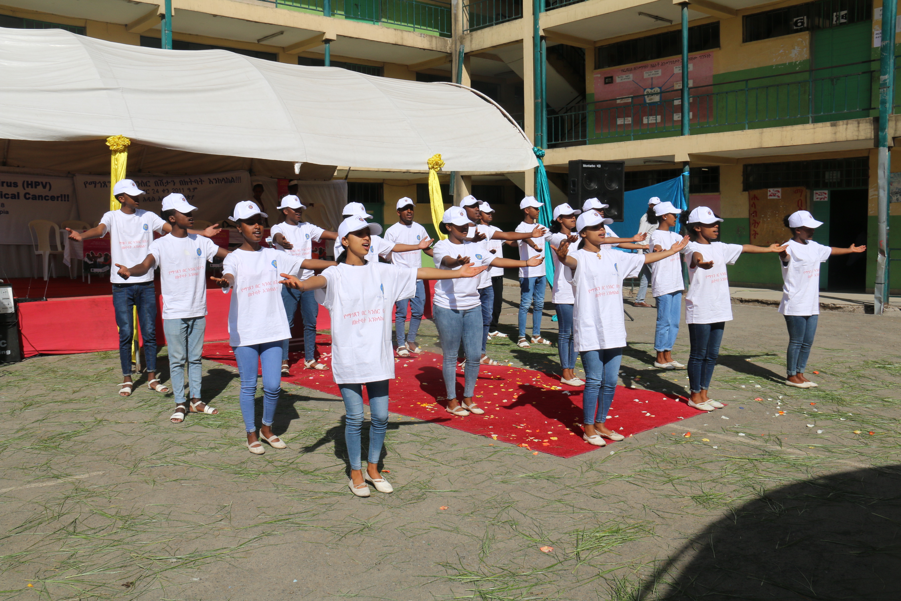 Girls presenting a song advocating HPV vaccine