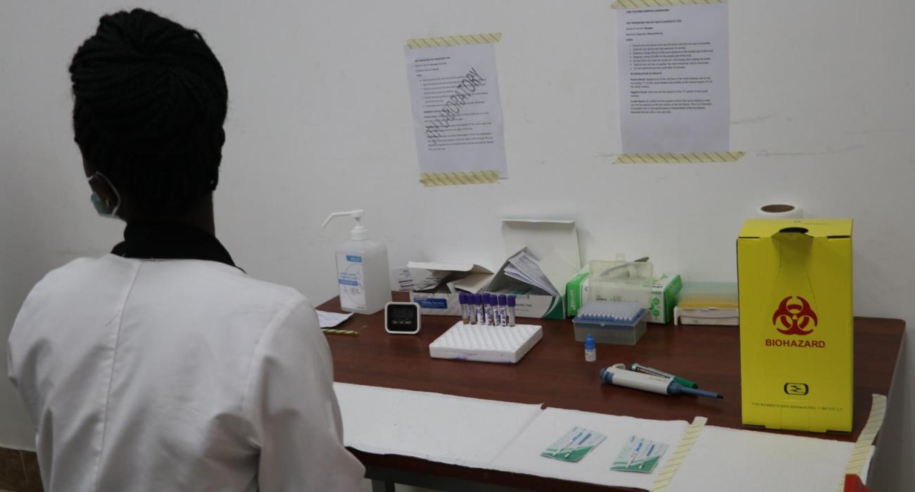 Healthcare worker screening a patient at Juba Teaching Hospital during the commemoration of the World Hepatitis Day in Juba