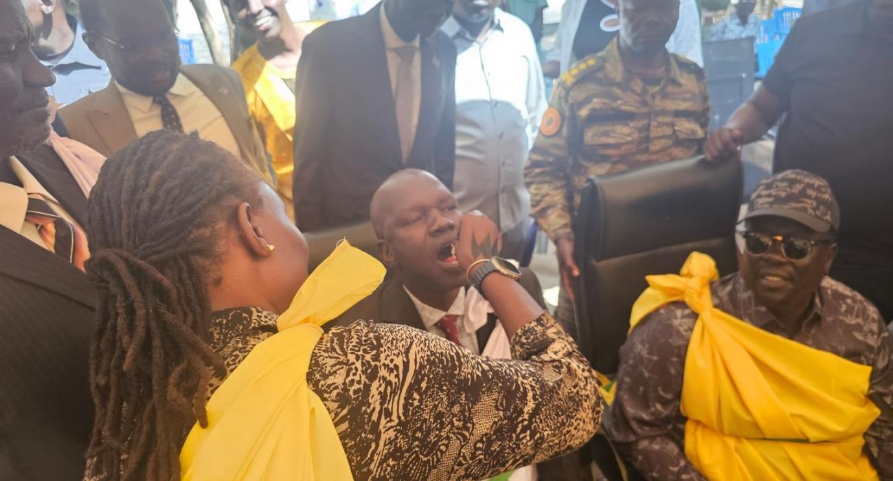 Honorable Minister of Health, Republic of South Sudan, Yolanda Awel Deng, administering oral cholera vaccine at Primary Health Care center in Rubkona