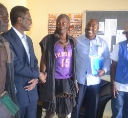 Dr Sagoe-Moses and Mr Shapumba greetings traditional leaders at the Kunene Regional Governor's Office