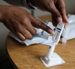 After seeing the video, people return to the counsellor and after further discussion, receive the self-testing kits and go into private cubicles to perform the test.