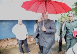 President Koroma, left, at the EOC working station being briefed by Dr Mufunda, WHO Representative