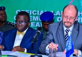 Nigerias Minister of Health (left) and EU Ambassador signing the documents for the 70 million euros grant