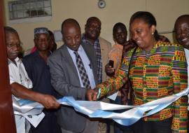  (R-L) Dr Bernice Dahn Minister of Health, Dr Alex Gasasira and Dr Walter Gwenigale cutting the ribbon to officially open the library