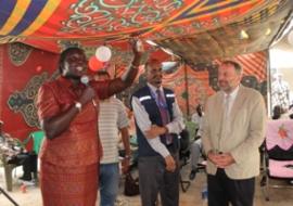 The State Minster of Health H.E. Jehan Deng shows off the key for the new maternity ward moments after receiving it from Dr Abdi Aden Mohamed, WHO Representative for South Sudan, the Canadian Ambassador to South Sudan Nick Coghan and the contractor who built the maternity ward