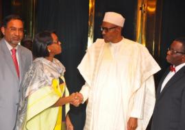 President Buhari of Nigeria welcoming the WHO RD, Dr Moeti to the State House in Abuja