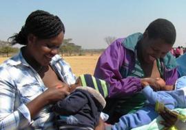 Some of the mothers who attended the launch breastfeeding and bonding with their babies