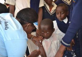 Young student gets the MR vaccination at the national launch in Narok County