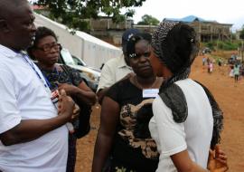 Mental Health Nurses engaging a community member affected by the mudslides disaster