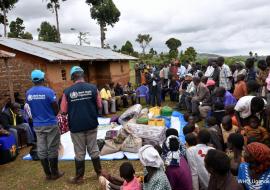 WHO Health Workers delivering the MVD Solidarity Package to the family of CJ, the second confirmed case.