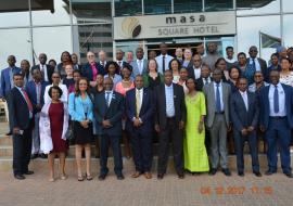 Joint internal and external evaluation team posing for a group photo