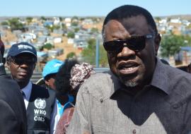 The President of the Republic of Namibia, His Excellency Dr Hage Geingob addressing the community of Havana informal settlement while the WHO Country Representative Dr Charles Sagoe-Moses looks on