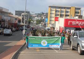 Community members marching through the streets of Mbabane