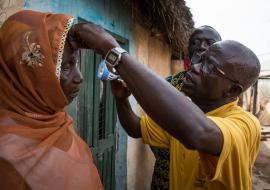 Fusi, an Opthalmic nurse screens communities in Yendi  Photo: Ruth McDowall/Sightsavers 2016