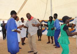 Honorable MP for Norton, Temba Mliswa dancing with some of the psychiatric patients during the launch