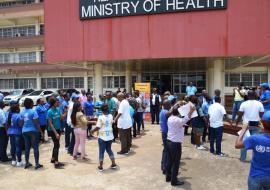 Health partners in Liberia formed a solidarity as a symbol of their commitment to working collaboratively towards UHC during the 2019 WHD commemoration in Liberia 