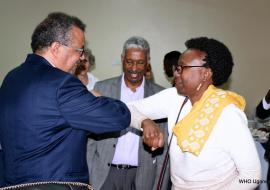 WHO Director General Dr Tedros (left) received by the Minister of Health Dr Dr Aceng (right) as WHO Uganda Country Representative- Dr Yonas Tegegn Woldemariam looks on