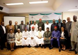 Minister of Health (seated 3rd right), Convener and  Senate Committee Chairman on Health (seated 4th  Right) at the retreat in Abuja