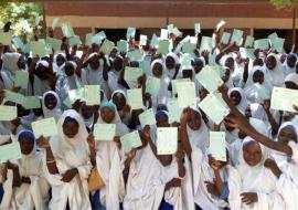 School children showing their yellow fever vaccination cards after receiving the vaccine in Katsina state