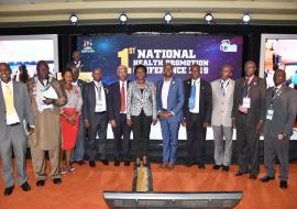 Minister of Health Dr Jane Ruth Aceng, WHO Representative to Uganda, Dr Yonas Tegegn Woldemariam and, Dr Githingi Gitahi, the Group Chief Executive Officer of Amref Health Africa with delegates at the Health Promotion Conference