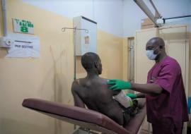 Nurse Akande attending to a patient at the accident and emergency ward of Maitama District hospital Photo credit_Ogbeide_WHONigeria.jpg