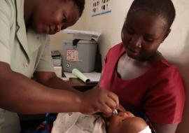 A child receiving vaccine during the commemorations